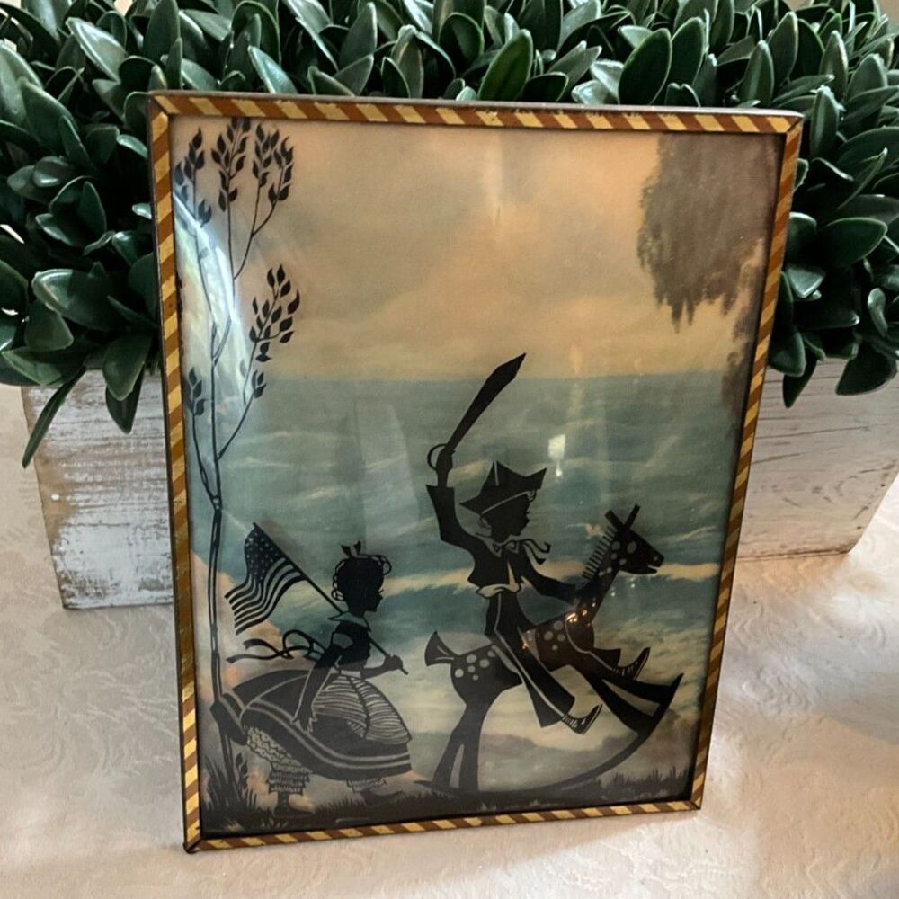 Beautiful vintage silhouette picture boy and girl on rocking horse bowed glass